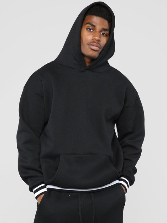 Men’s Minimalistic Loose Pullover Hoodie With Front Pocket And A Stripped Hem - Misty grey / XL